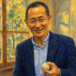 Portrait of a smiling man in a blue blazer holding a small ball, standing in a sunlit room with a colorful painting in the background.